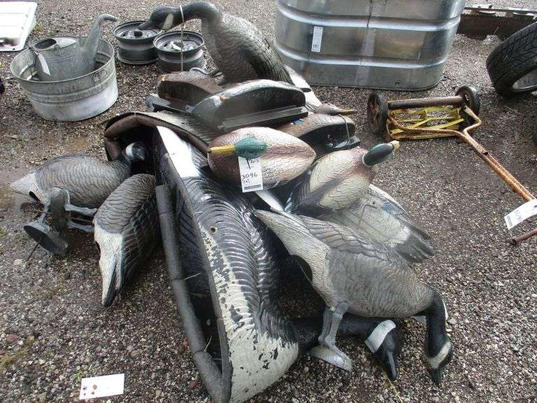 (2) XXL floating goose decoys with weights; (8) Stakedown goose decoys