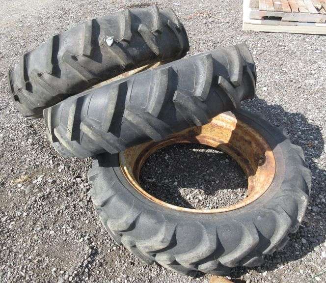 (3) Ford 8N tires and rims, 2 rims are rustedthrough but tires are