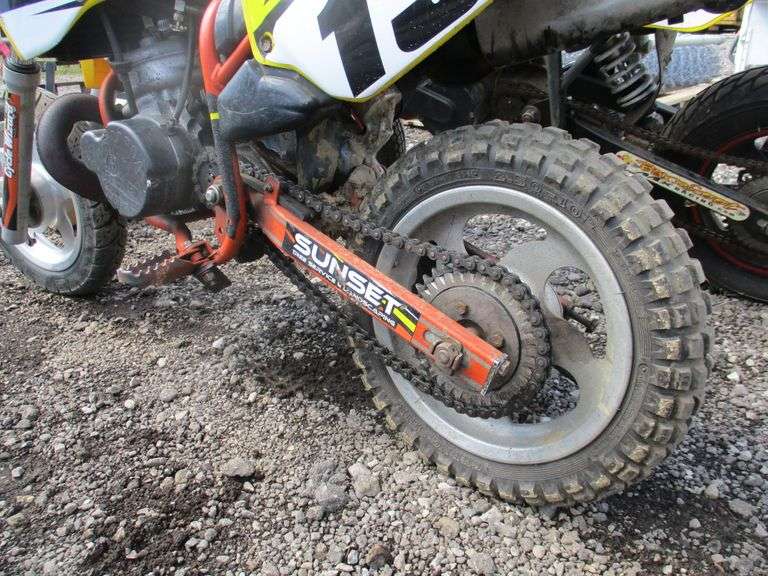 (2) 50cc Cobra dirt bikes, parts for racing, ice tires, 65cc conversion