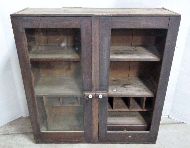 Antique wood cabinet, has shelves and pullout drawer on the inside