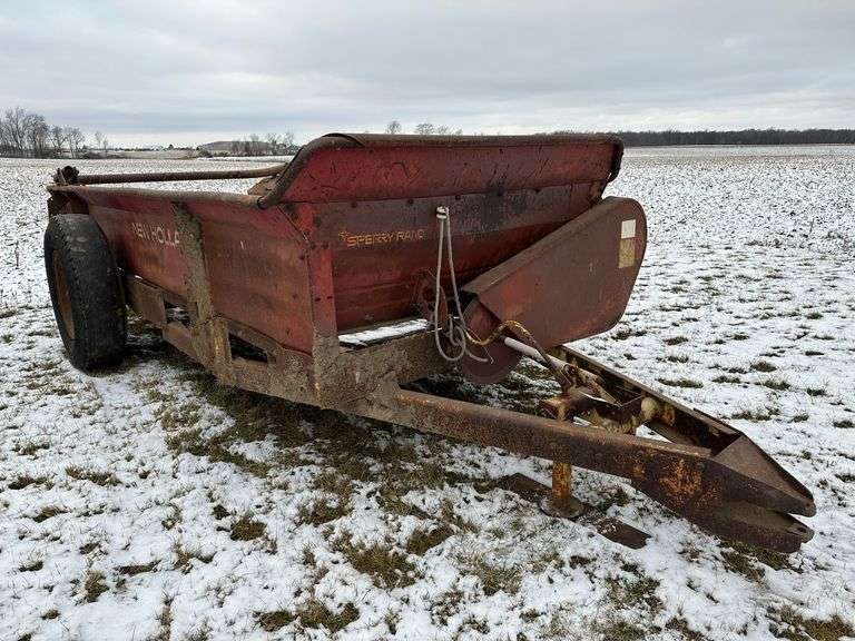 New Holland Manure Spreader, 20" Tires, Missing Parts. Selling for