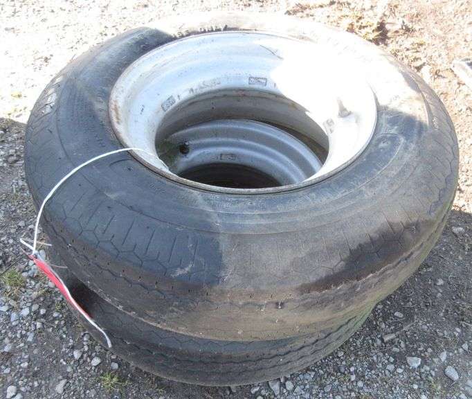 (2) Trailer tires and wheels, open centers, 7 x 14.5, good Albrecht
