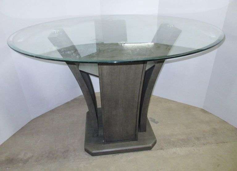 Gray base kitchen table with glass top, 54"Dia x 36 1/2"H, great Albrecht Auction Service
