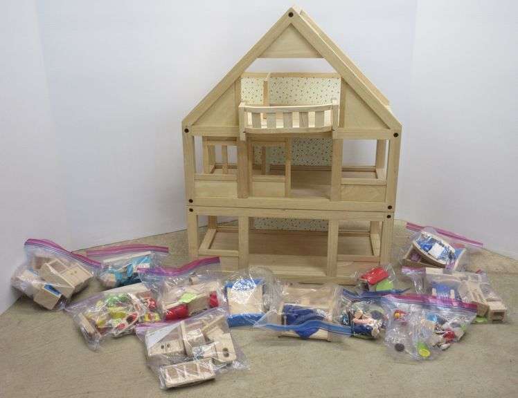Plan toys wood doll house with lots of original wood furniture pieces
