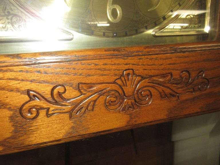 Howard Miller 65th anniversary edition grandfather clock with weighted