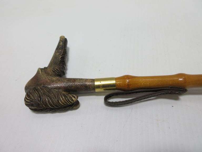 Dog head shoe horn, made in Italy, 21"L Albrecht Auction Service