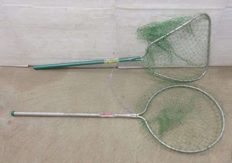 (2) Cummings fish landing nets, approx. 4'L Albrecht Auction Service