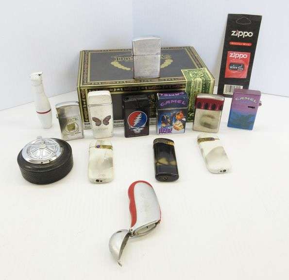 (11) Older refillable lighters, include 1970s Buick Zippo suggestion