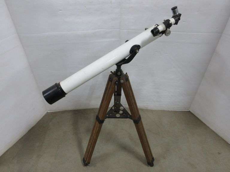 Tasco Astronomical Telescope, mounted on a heavy adjustable wood tripod