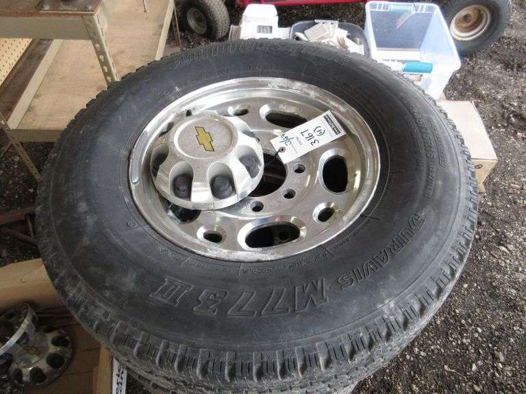 (4) Chevy 8Lug Rim, Tire, Lugnuts, and Center Caps, tire have a lot of