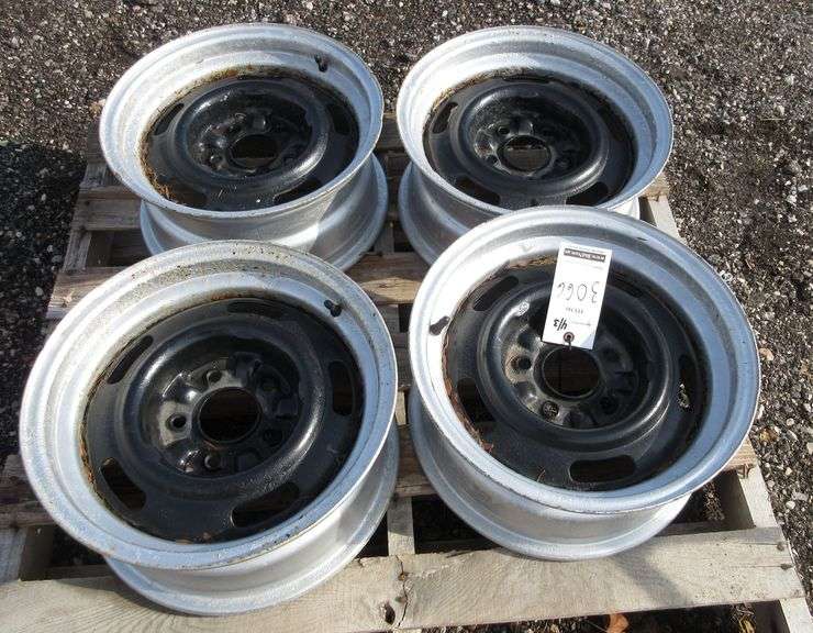 Set of (4) rims for a trailer, 5lug, 15" Albrecht Auction Service