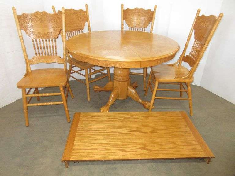 Oak round clawfoot table, 48", with 24" leaf, and (4) chairs, in very