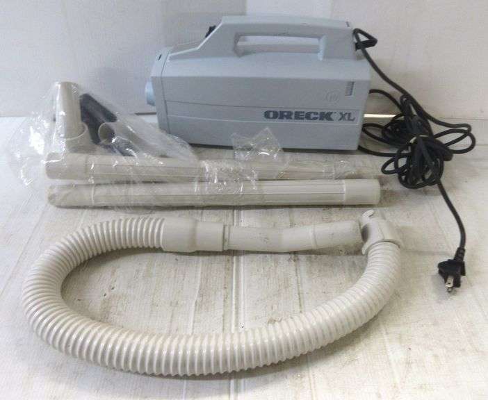 Oreck XL vacuum with accessories, 13"L, works Albrecht Auction Service