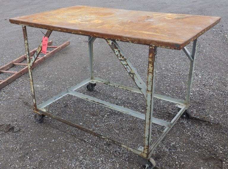 Steel shop table with casters, 60 1/2" x 37" x 39"H, used Albrecht