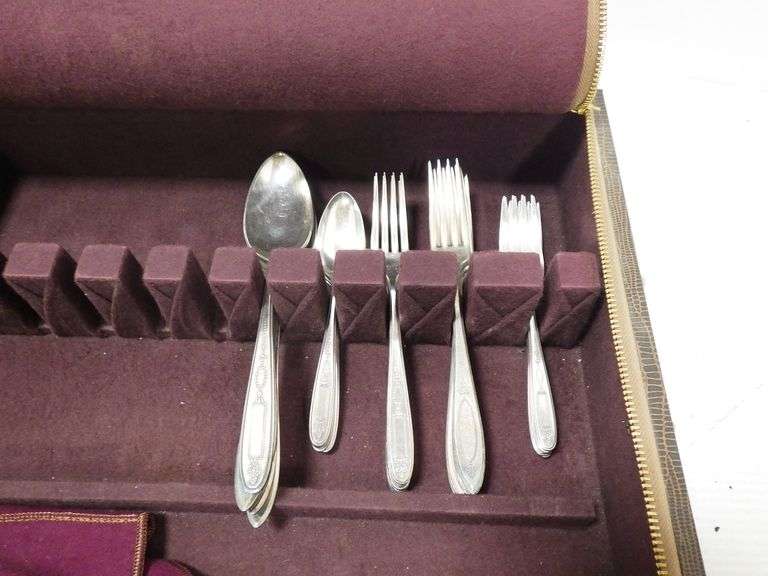 (36) Pieces of antique community plate flatware in a Nakens tarnish