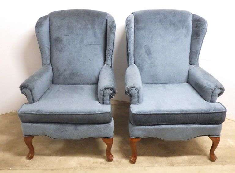 Pair of wingback blue chairs, made in USA, Seats 27"W x 18 1/2"H Albrecht Auction Service
