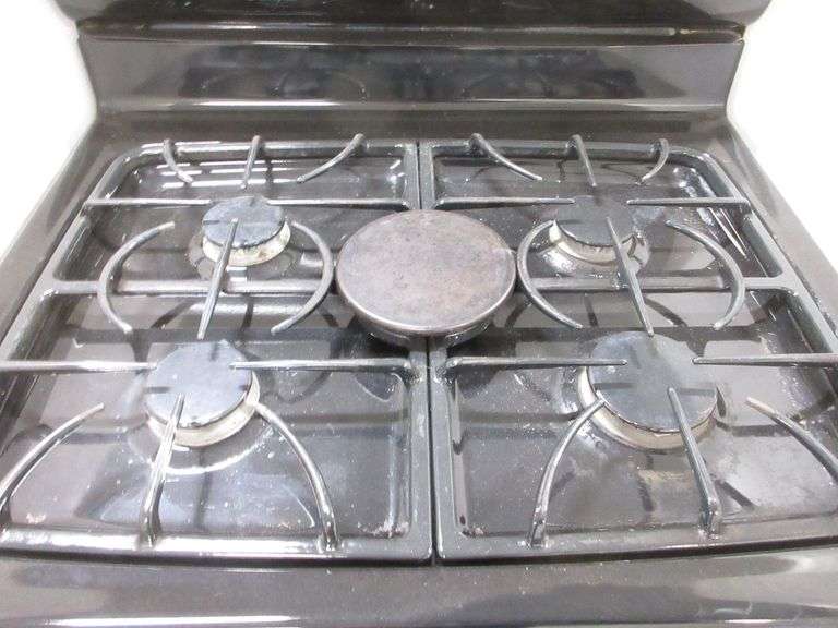 Maytag gas stove, 29 1/2"W, wear on grates, nice, works well Albrecht