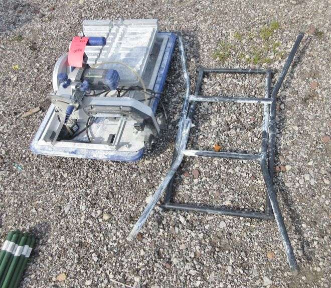 Kobalt tile saw with stand, been outside, may not work, as is