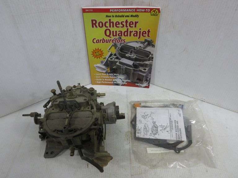 Quadrajet carburetor with book and rebuilt kit, good Albrecht Auction
