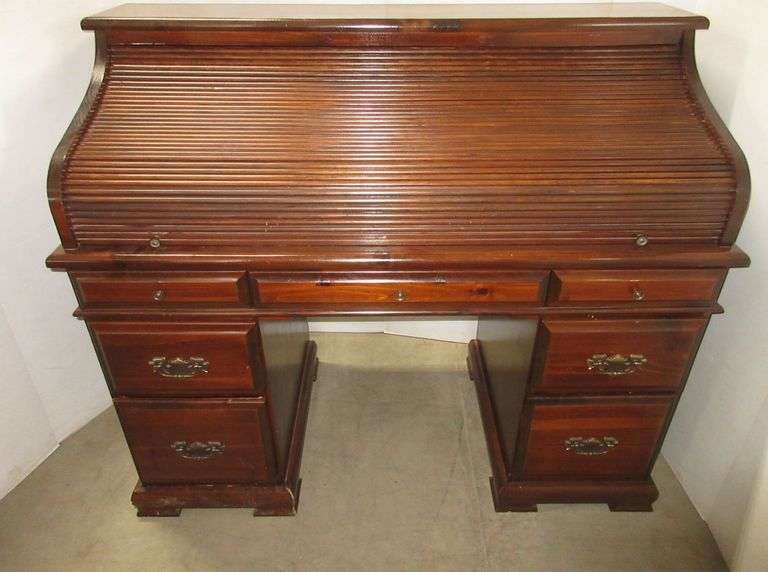 Pine roll top desk, 52"W x 24"D x 44"H Albrecht Auction Service