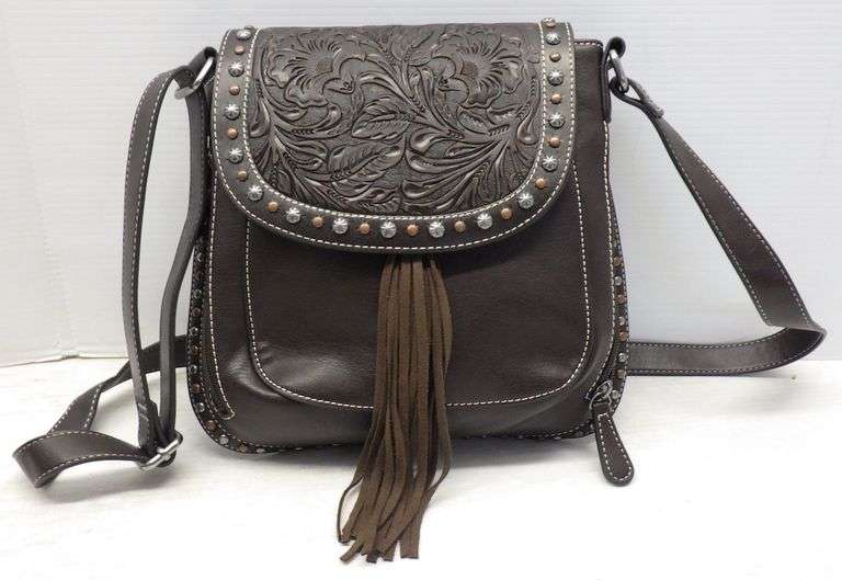 Nocona conceal carry purse, 10"W x 9"H, like new Albrecht Auction Service