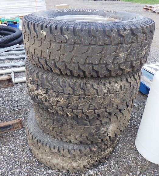 (4) Ford 8lug rims, LT285/75 16 used Albrecht Auction Service