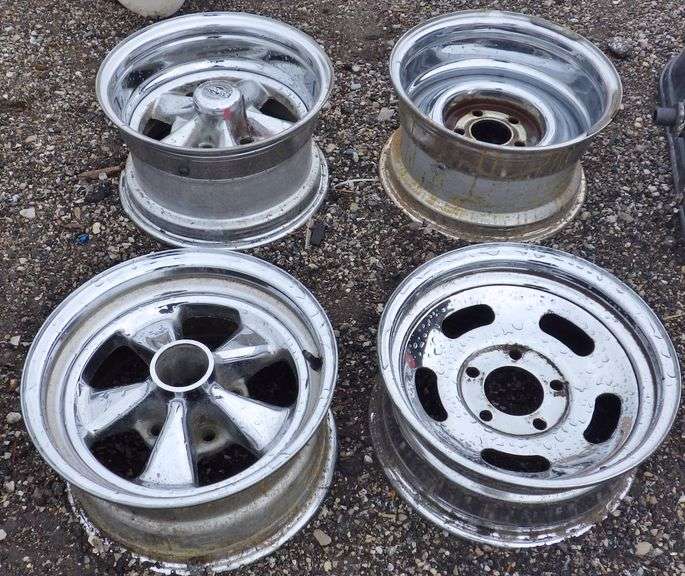 (4) Vintage chrome wheels, all different Albrecht Auction Service