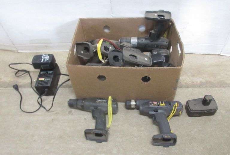 Box with drills and batteries Albrecht Auction Service