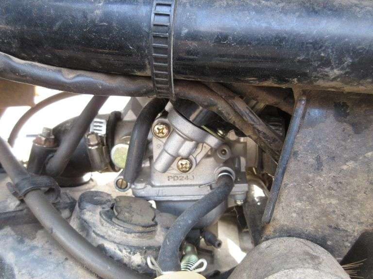 Late 1990's 125cc Moto x Chinese 4Wheeler, exhaust broke off at