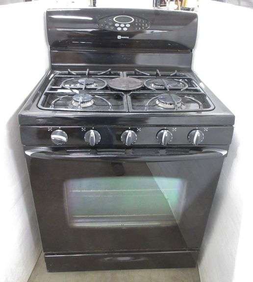 Maytag gas stove, 29 1/2"W, wear on grates, nice, works well Albrecht Auction Service