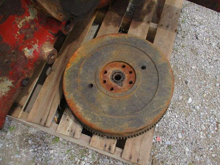 Farmall M gear case and flywheel, used Albrecht Auction Service
