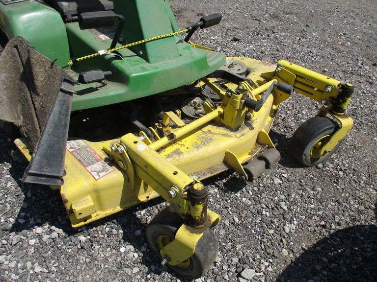 John Deere F525 riding lawn mower, does have a flat tire, mower deck on