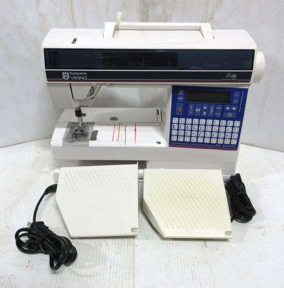 Husqvarna Viking Lily embroidery sewing machine with foot pedal and
