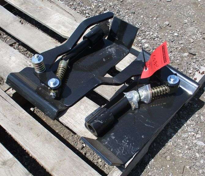 Universal skid steer quick tach conversion handles adapter to quick