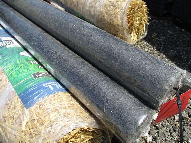(3) Rolls of black weed barrier; (3) Rolls of straw for grass planting