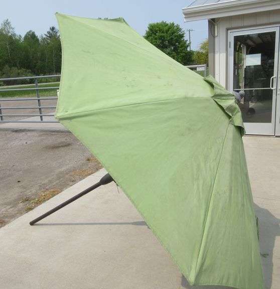 Patio umbrella, no holes, rips, or tears, crank does not work, and has