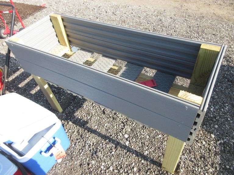 Raised garden bed box, made from 1"Thick Trex deck boards, the legs are