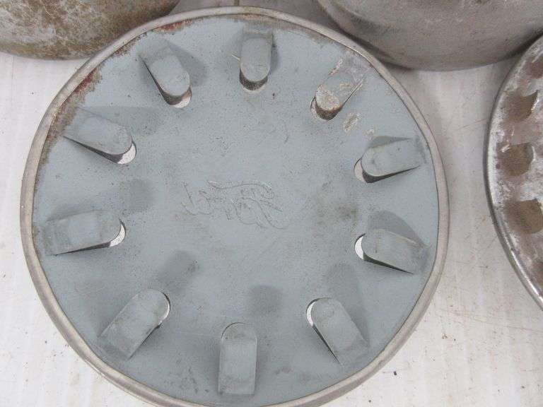Set of (4) Ford Model A hubcaps, 4 1/4"Dia, have minor wear, one has