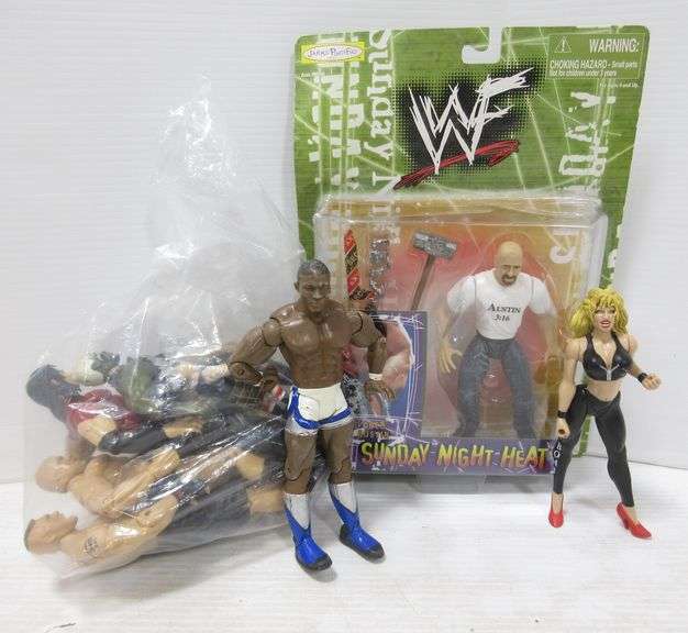 Older WWE and WWF wrestling figures, up to 6"H Albrecht Auction Service