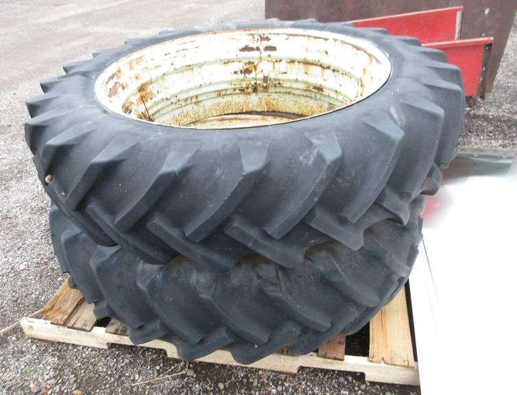 (2) 13.6X 38 on rims, B.F Goodrich power grip tractor tires with clamps