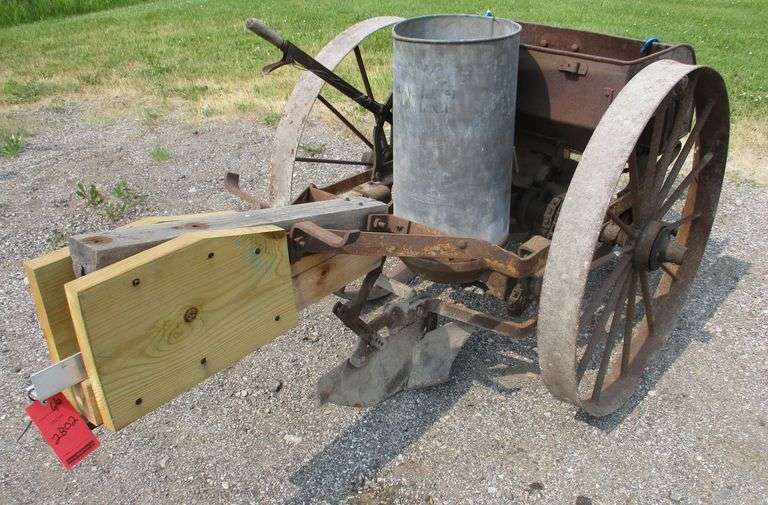 Early 1900s potato planter, 40"W x 96"L, used last year, refurbished