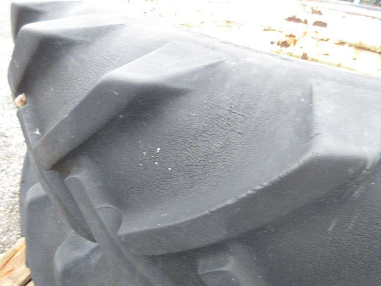 (2) 13.6X 38 on rims, B.F Goodrich power grip tractor tires with clamps