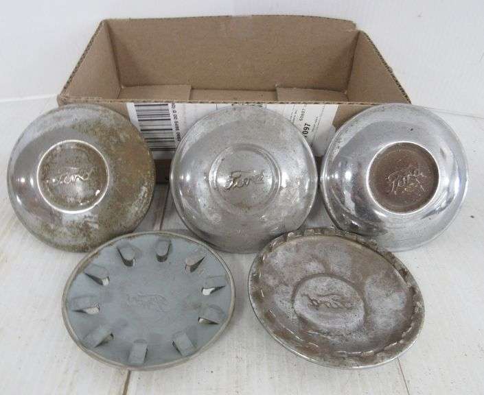 Set of (4) Ford Model A hubcaps, 4 1/4"Dia, have minor wear, one has