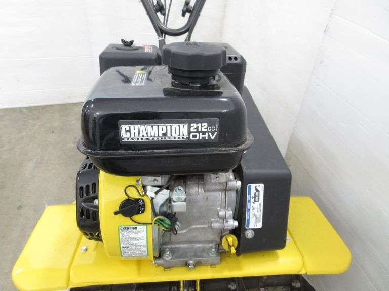 Champion front tine tiller, model 100379, runs great and starts up
