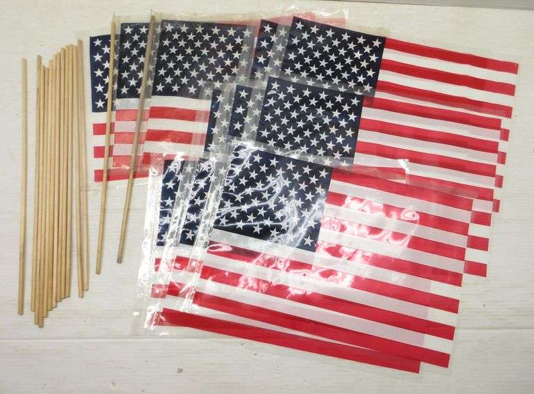 (11) Plastic American flags with wooden dowels, 17 1/2" x 12" dowels