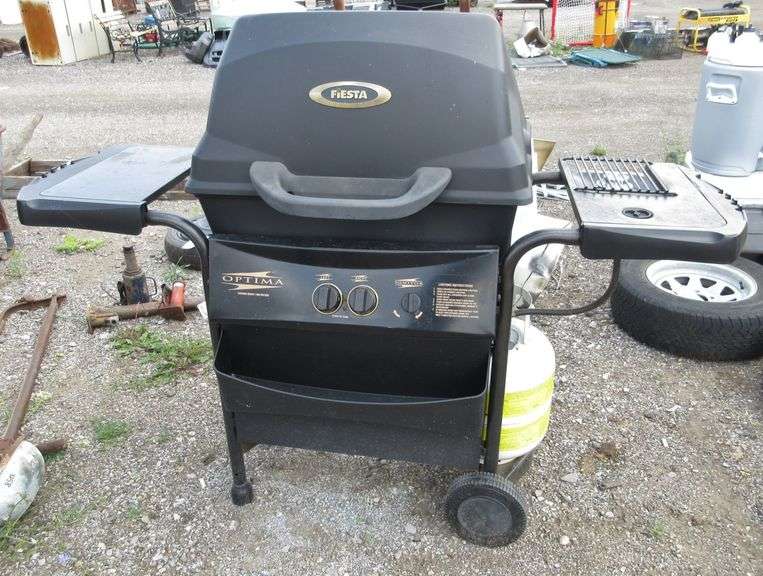 Fiesta Optima grill with propane tank, two burner with side burner, 64