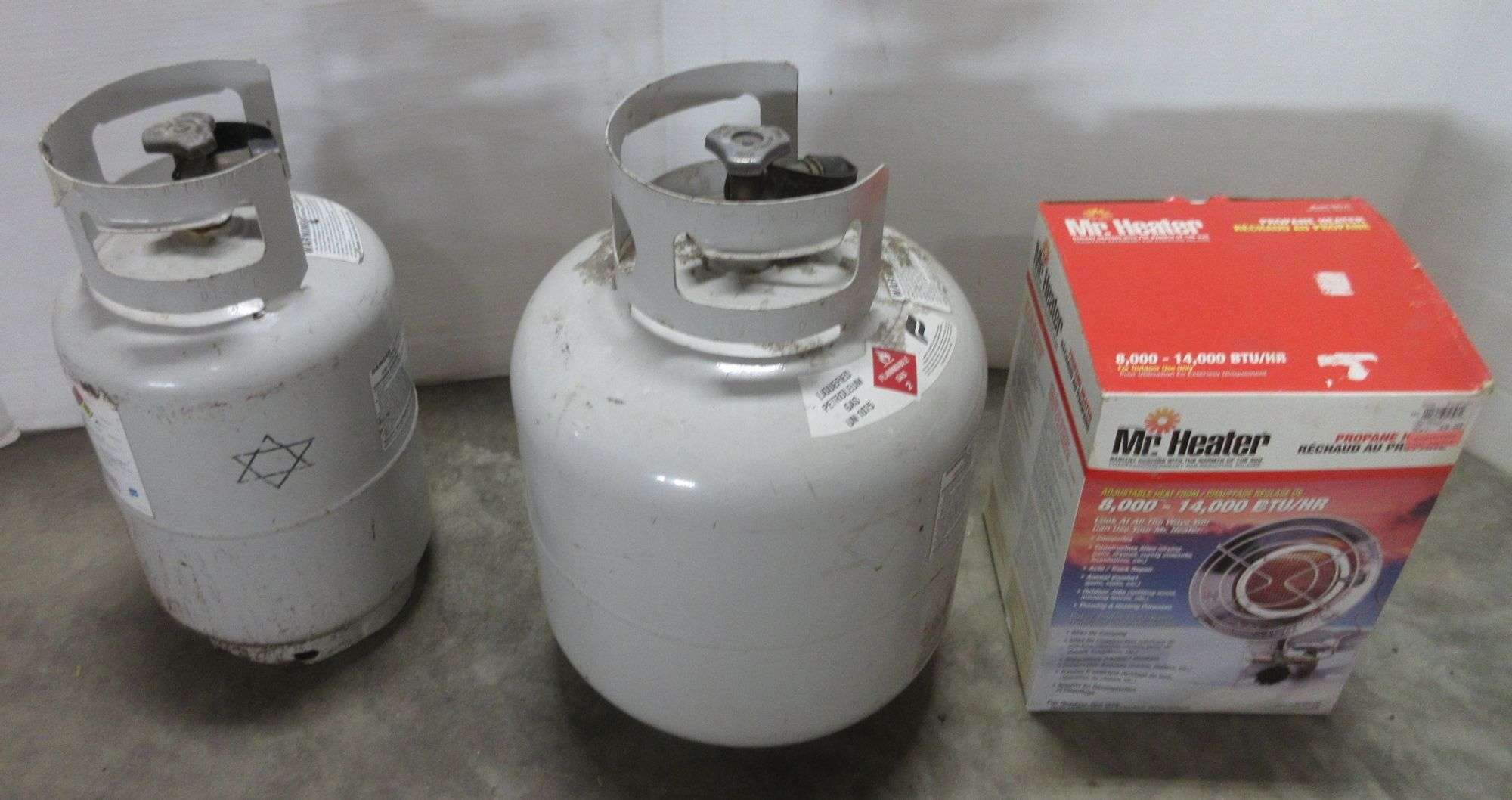 Mr. Heater 8,000-14,000 BTU-HR, includes: One- 20 lb. Propane Tank; One- 13  lb. Propane Tank, both tanks are full, in new condition - Albrecht Auction  Service