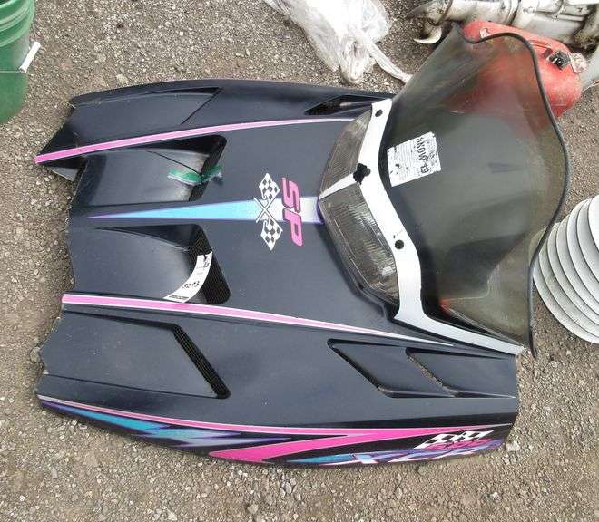 Snowmobile cap gauges, head light, and windshield Albrecht Auction Service