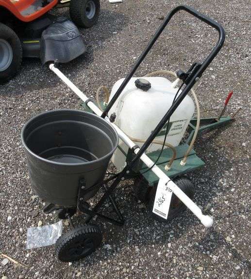 Handy lawn sprayer with three nozzles on bottom, and a push lawn
