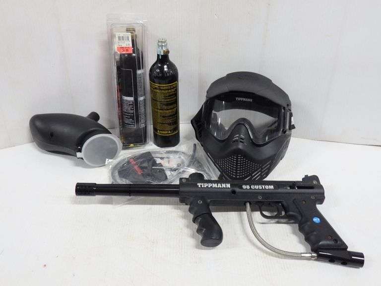 Tippmann 98 custom paintball gun, Tippmann mask, paintball holder that hooks to gun, and (2) 12